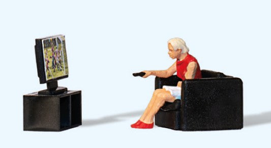 HO Woman in Front of TV Sitting in Chair